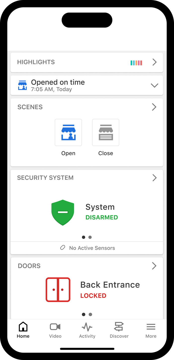 Alarm.com app business screen showing security, doors and scenes