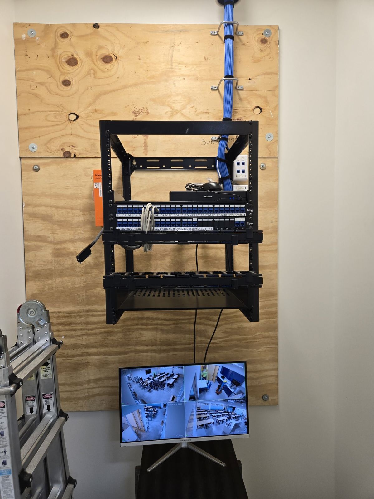 Equipment rack with a recorder and live camera monitor